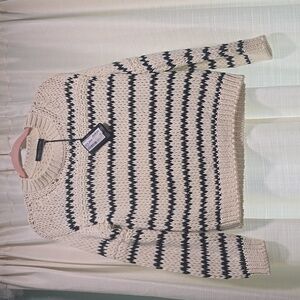 Striped sweater in white and blackCotton blend crewneck pullover Color.